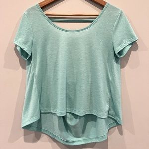Delia’s teal open back t shirt